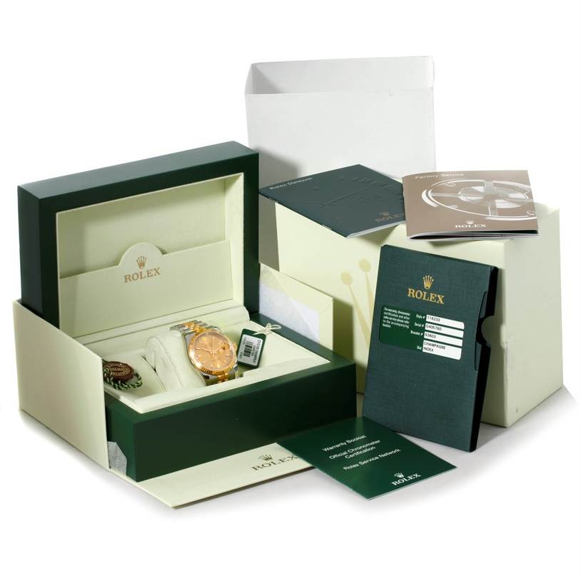 The image shows the Rolex Datejust 116233 Men
s Stainless Steel Champagne Dial 116233 Men
s Stainless Steel Champagne Dial watch and accessories with booklets, tags, and the branded box from a frontal angle.