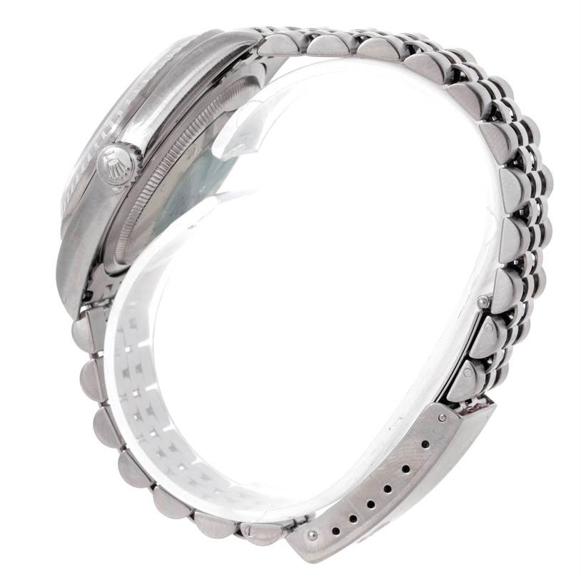 This side view shows the casing, crown, and bracelet of the Rolex Datejust 16220 Men's Stainless Steel Silver Dial 16220 Men's Stainless Steel Silver Dial, highlighting its metallic finish.