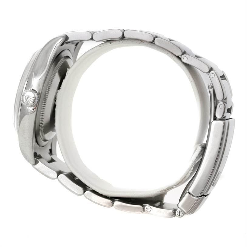 The image shows the side profile of a Rolex Datejust 116200 Men's Stainless Steel Blue Dial 116200 Men's Stainless Steel Blue Dial watch, highlighting the bracelet and side of the case.