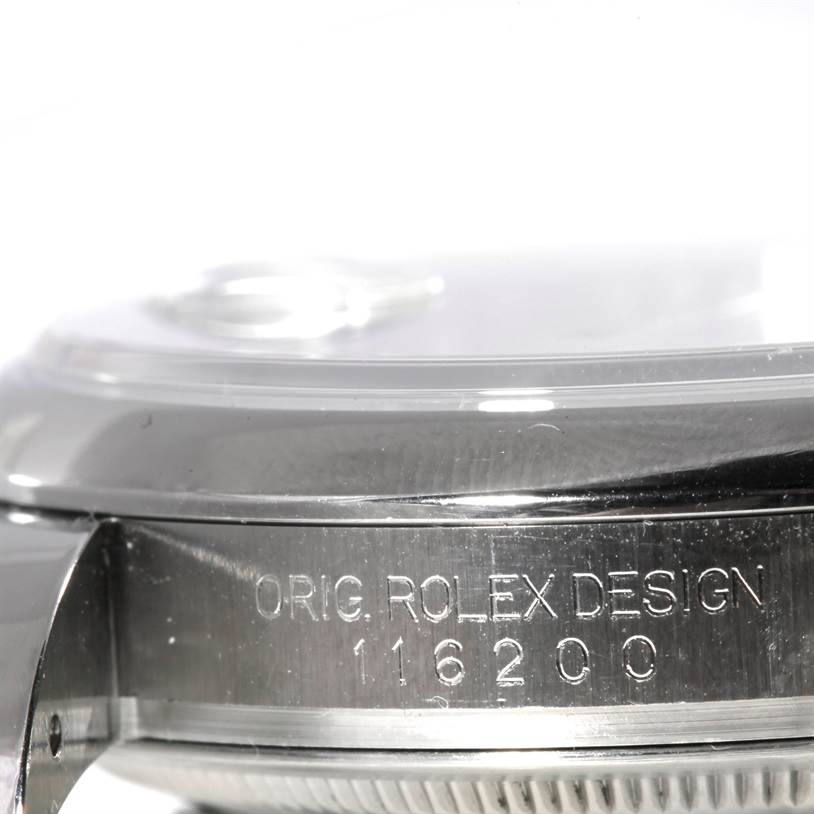 This image shows the side view of a Rolex Datejust 116200 Men
s Stainless Steel Black Dial 116200 Men
s Stainless Steel Black Dial watch, highlighting the model number "116200" and "ORIG. ROLEX DESIGN" engraving.