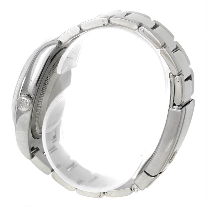 This image shows a side view of a Rolex Datejust 116200 Men
s Stainless Steel Black Dial 116200 Men
s Stainless Steel Black Dial watch, focusing on the crown, case, and bracelet.