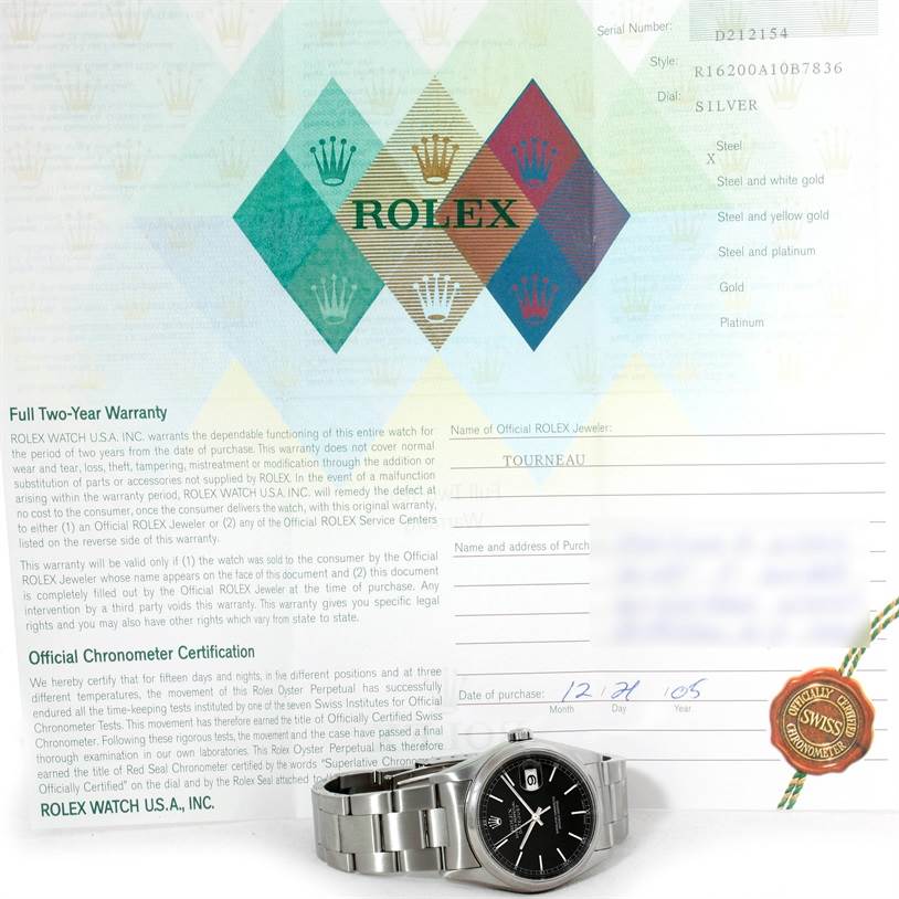 The image shows a Rolex Datejust 16200 Men's Stainless Steel Black Dial 16200 Men's Stainless Steel Black Dial watch with a black dial and steel bracelet, positioned in front of its warranty and certification documents.