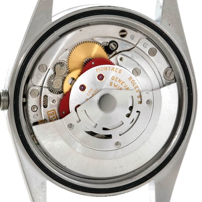 This image shows the interior mechanism and movement of a Rolex Datejust 16220 Men's Stainless Steel Blue Dial 16220 Men's Stainless Steel Blue Dial watch.