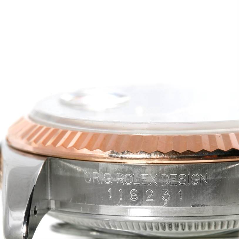 The image shows a close-up side view of the bezel and case of a Rolex Datejust 116231 Men's Steel and Gold (two tone) Pink Dial 116231 Men's Steel and Gold (two tone) Pink Dial watch, displaying the model number 116231.