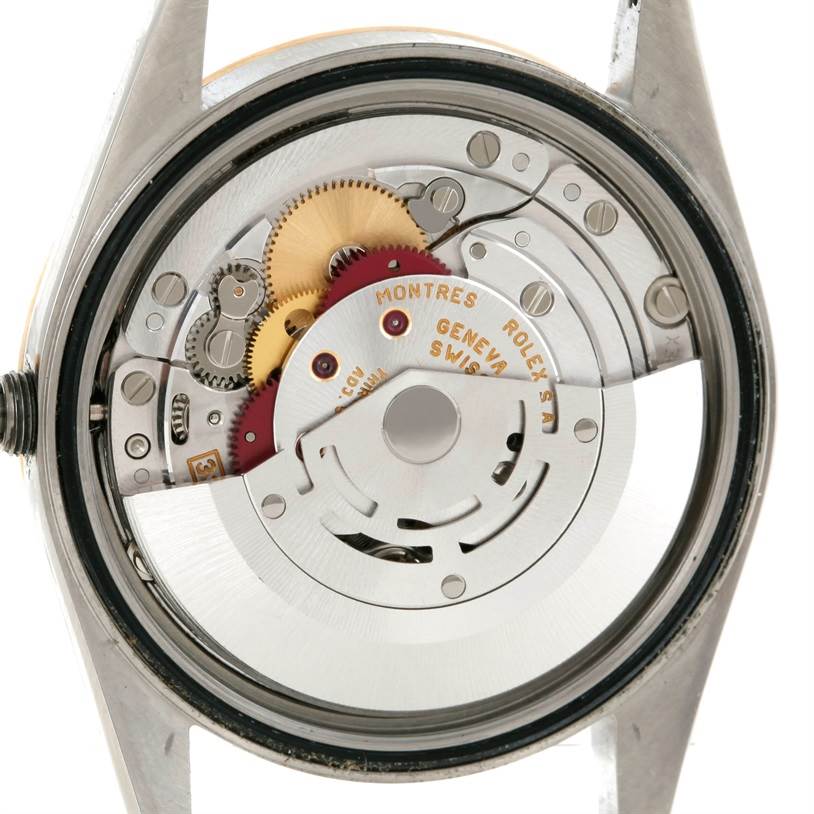 The image shows the internal mechanism of a Rolex Datejust 16203 Men's Steel and Gold (two tone) Silver Dial 16203 Men's Steel and Gold (two tone) Silver Dial watch, viewed from the back.