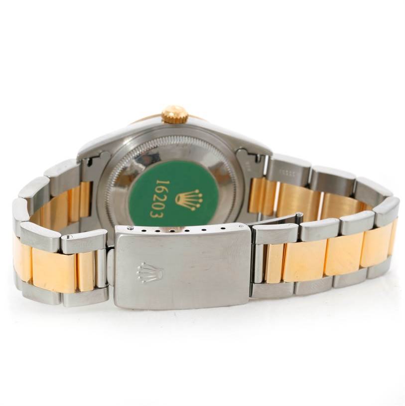 The image shows the back case and metal bracelet of a Rolex Datejust 16203 Men's Steel and Gold (two tone) Silver Dial 16203 Men's Steel and Gold (two tone) Silver Dial watch, model number 16203.