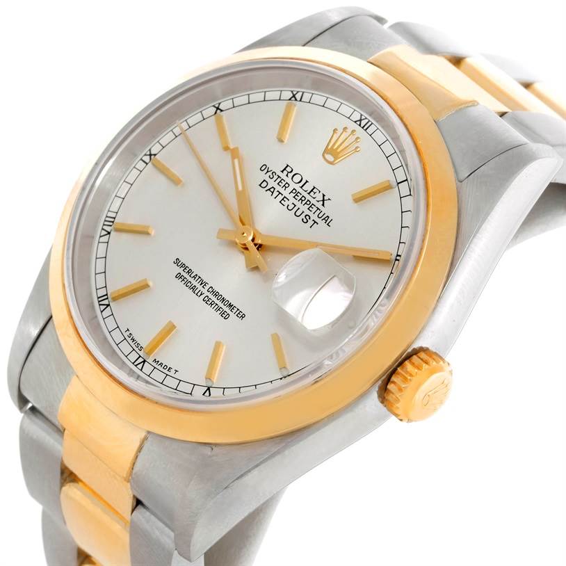 The Rolex Datejust 16203 Men's Steel and Gold (two tone) Silver Dial 16203 Men's Steel and Gold (two tone) Silver Dial watch is shown at a slight side angle, displaying the dial, crown, bezel, and part of the bracelet.