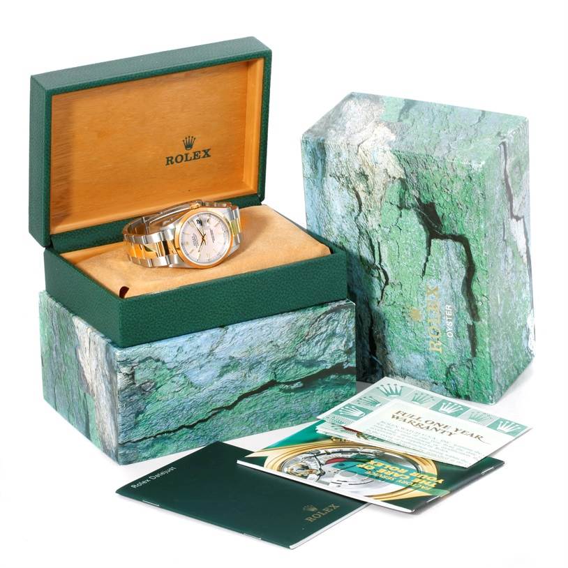 This image shows a Rolex Datejust 16203 Men's Steel and Gold (two tone) Silver Dial 16203 Men's Steel and Gold (two tone) Silver Dial watch in its open box, with additional packaging and documents displayed.
