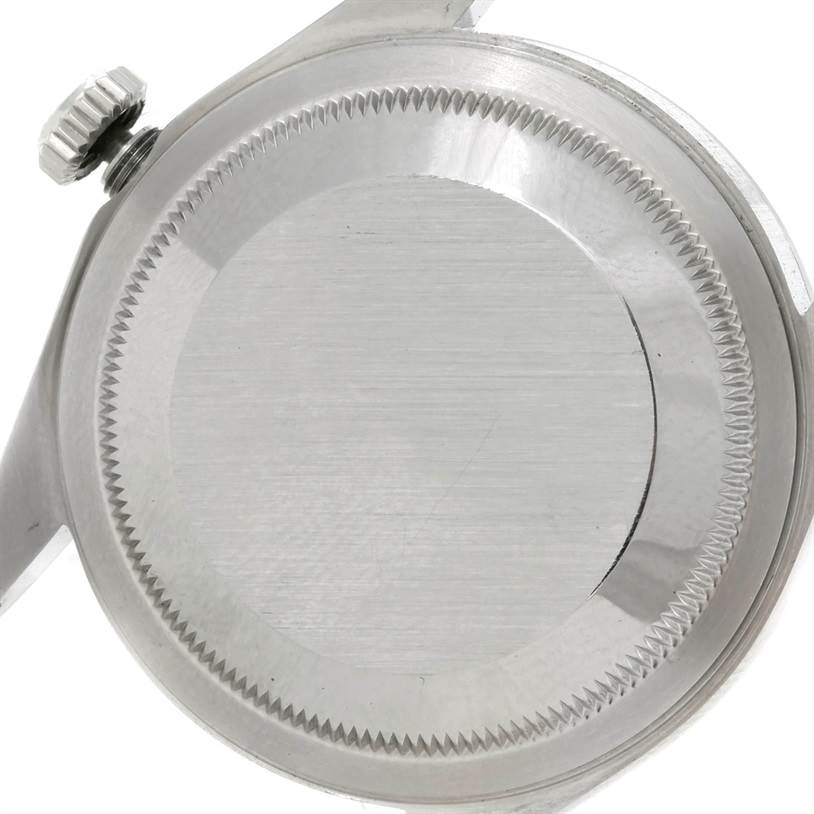 The image shows the back case and crown of a Rolex Datejust 16234 Men's Stainless Steel Silver Dial 16234 Men's Stainless Steel Silver Dial watch from a close-up angle.