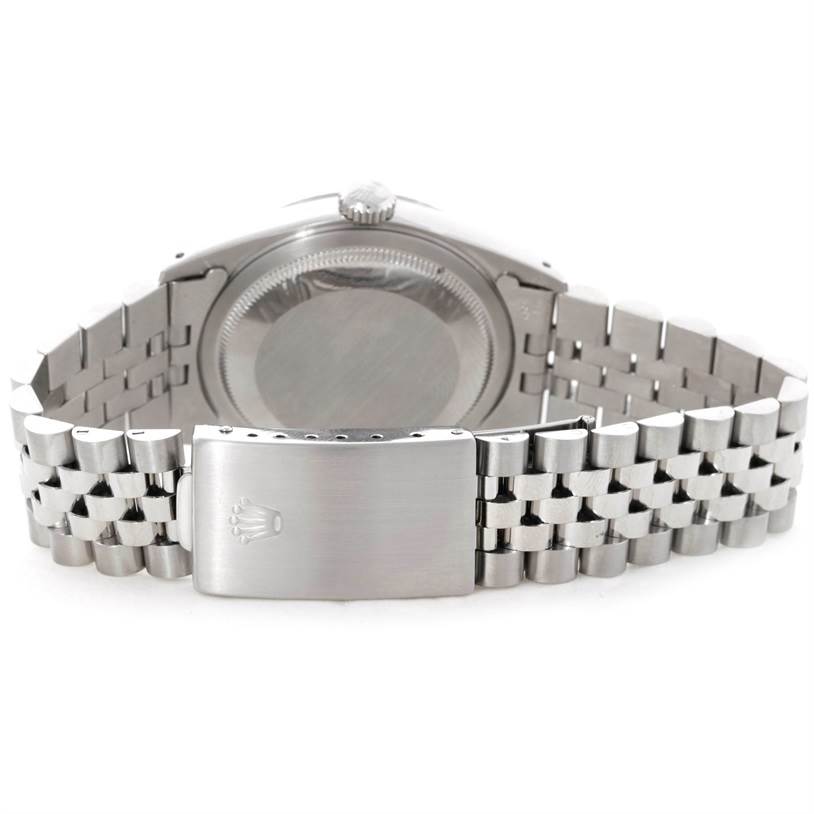 The image shows the back view of a Rolex Datejust 16234 Men's Stainless Steel Silver Dial 16234 Men's Stainless Steel Silver Dial watch, highlighting the case back and the Jubilee bracelet with the Rolex logo on the clasp.