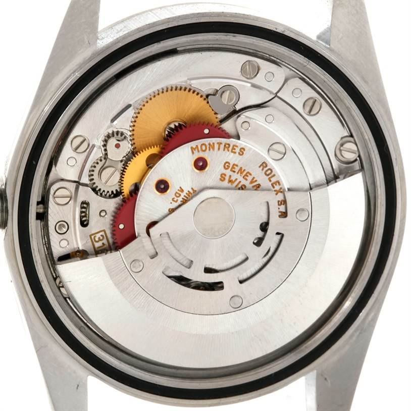 This image shows the internal mechanism and movement of a Rolex Datejust 16234 Men's Stainless Steel Silver Dial 16234 Men's Stainless Steel Silver Dial watch viewed from the back.