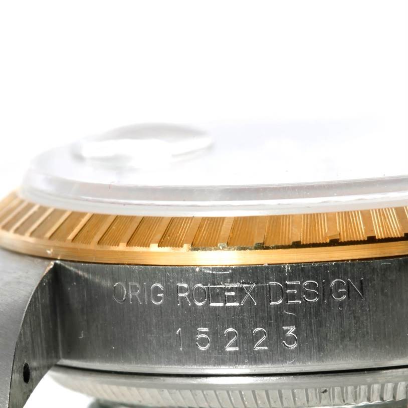 This image shows a close-up of the side and bezel of the Rolex Datejust 15223 Men's Steel and Gold (two tone) White Dial 15223 Men's Steel and Gold (two tone) White Dial watch, showing the model number 15223.