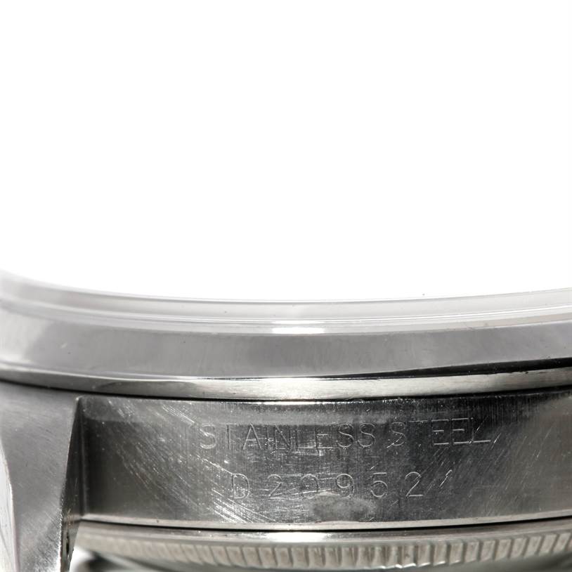 This image shows the side of the stainless steel case of a Rolex Datejust 16200 Men's Stainless Steel Silver Dial 16200 Men's Stainless Steel Silver Dial watch.