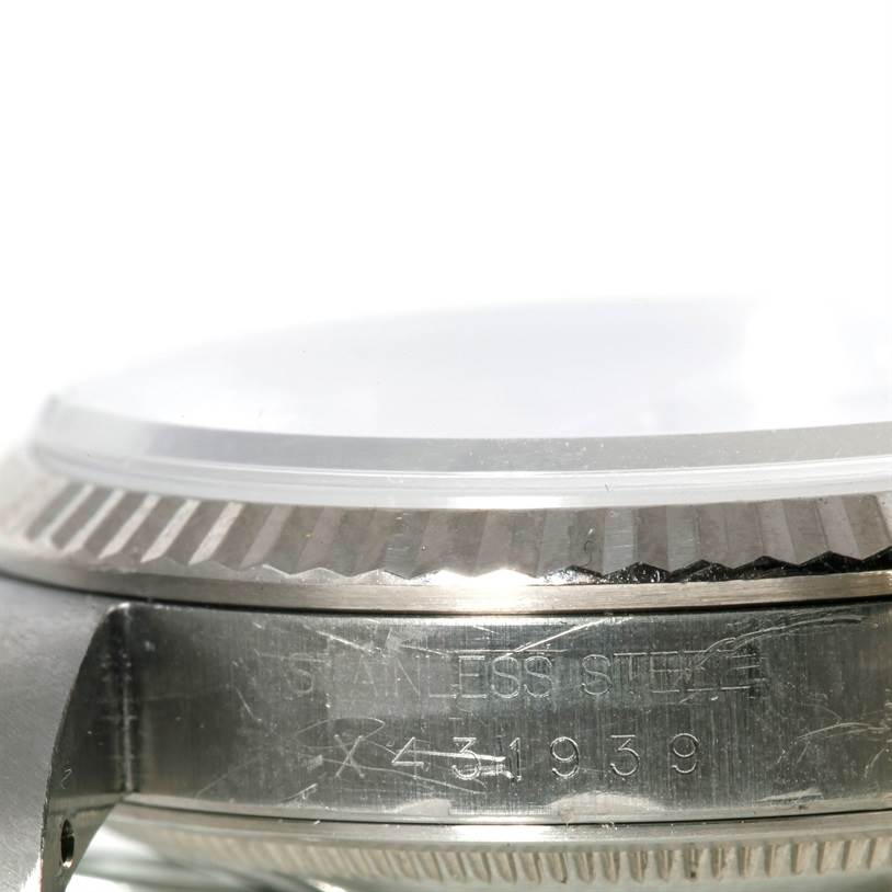 This image shows a close-up of the side of a Rolex Datejust 16234 Men's Stainless Steel Silver Dial 16234 Men's Stainless Steel Silver Dial watch, highlighting the case and part of the bezel.