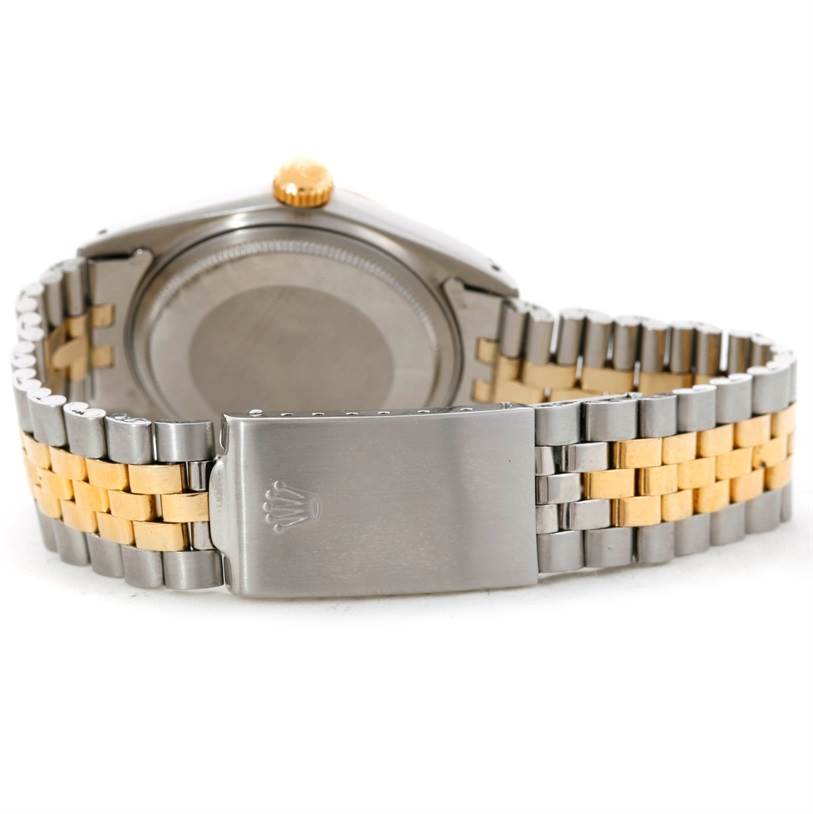 The image shows the back view of a Rolex Datejust 1601 Men's Stainless Steel Brown Dial 1601 Men's Stainless Steel Brown Dial model watch, focusing on the case back and the two-tone metal bracelet with the clasp.