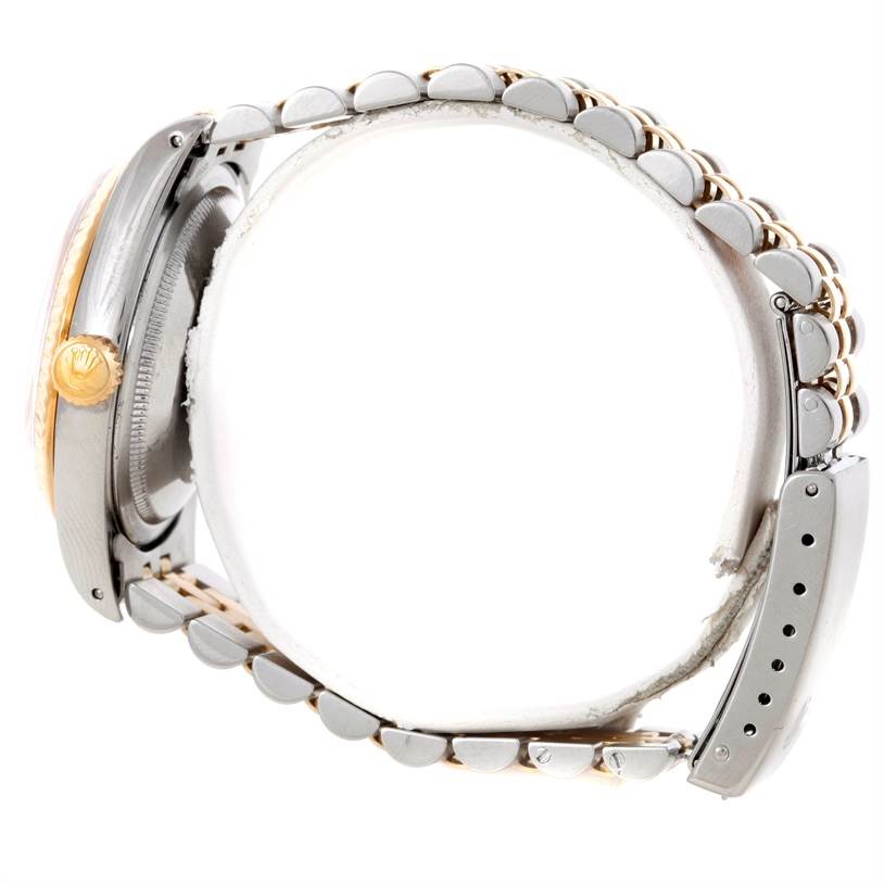 The image shows a side view of the Rolex Datejust 16233 Men's Steel and Gold (two tone) Champagne Dial 16233 Men's Steel and Gold (two tone) Champagne Dial watch, including the case, bezel, crown, and bracelet.