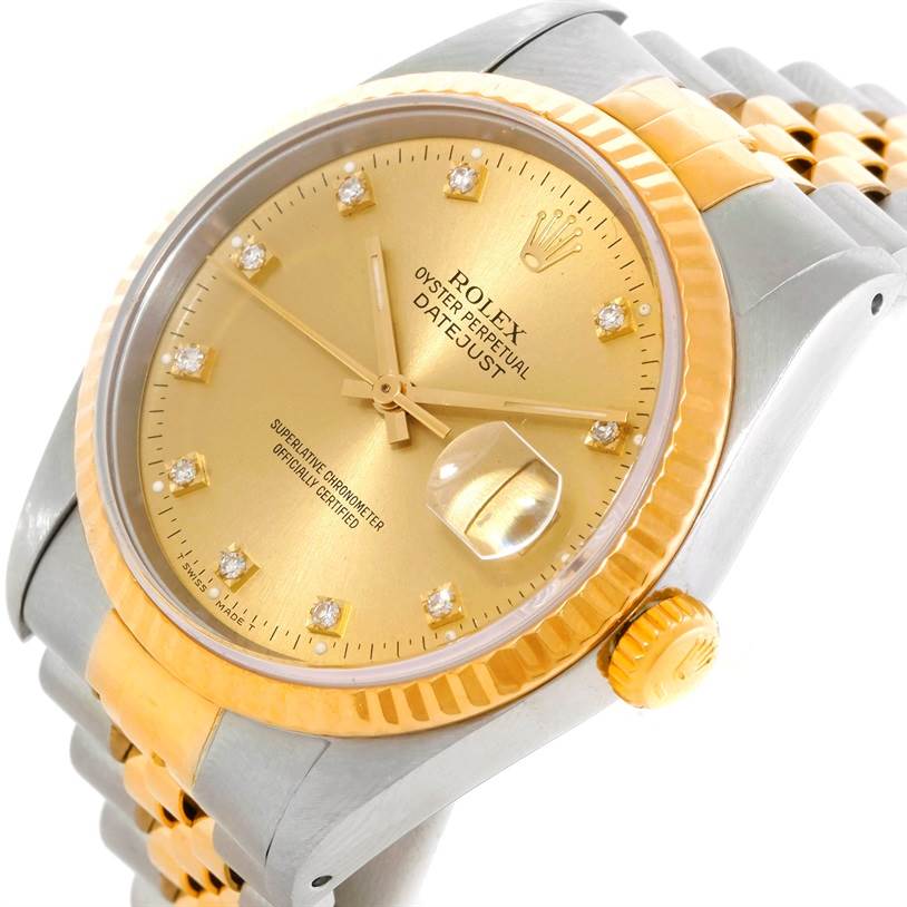 The image shows a Rolex Datejust 16233 Men's Steel and Gold (two tone) Champagne Dial 16233 Men's Steel and Gold (two tone) Champagne Dial watch at an angled close-up, highlighting the dial, fluted bezel, and part of the bracelet.