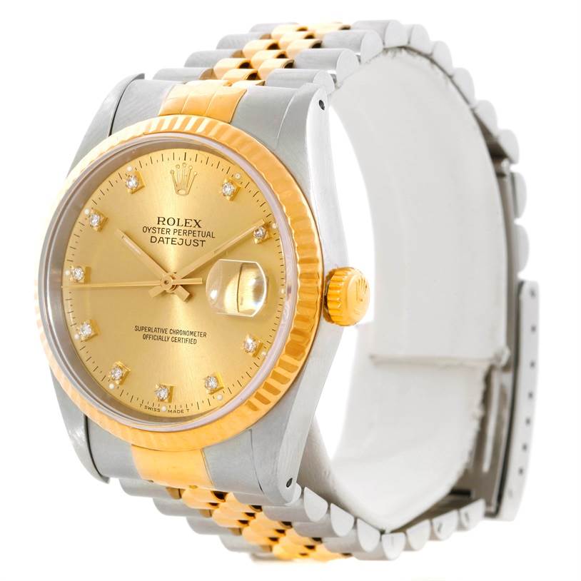 The Rolex Datejust 16233 Men's Steel and Gold (two tone) Champagne Dial 16233 Men's Steel and Gold (two tone) Champagne Dial watch is shown at a slight angle, displaying its gold dial, bezel, crown, and two-tone bracelet.