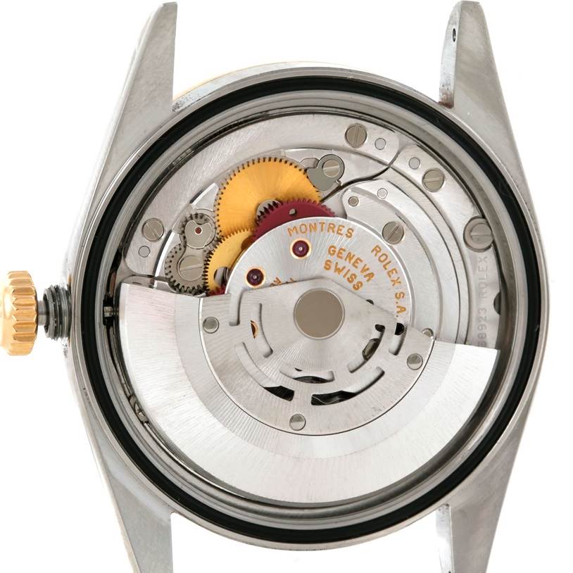 This image shows the inner mechanical movement of a Rolex Datejust 16203 Men's Steel and Gold (two tone) Champagne Dial 16203 Men's Steel and Gold (two tone) Champagne Dial watch from a rear angle with the case back removed.