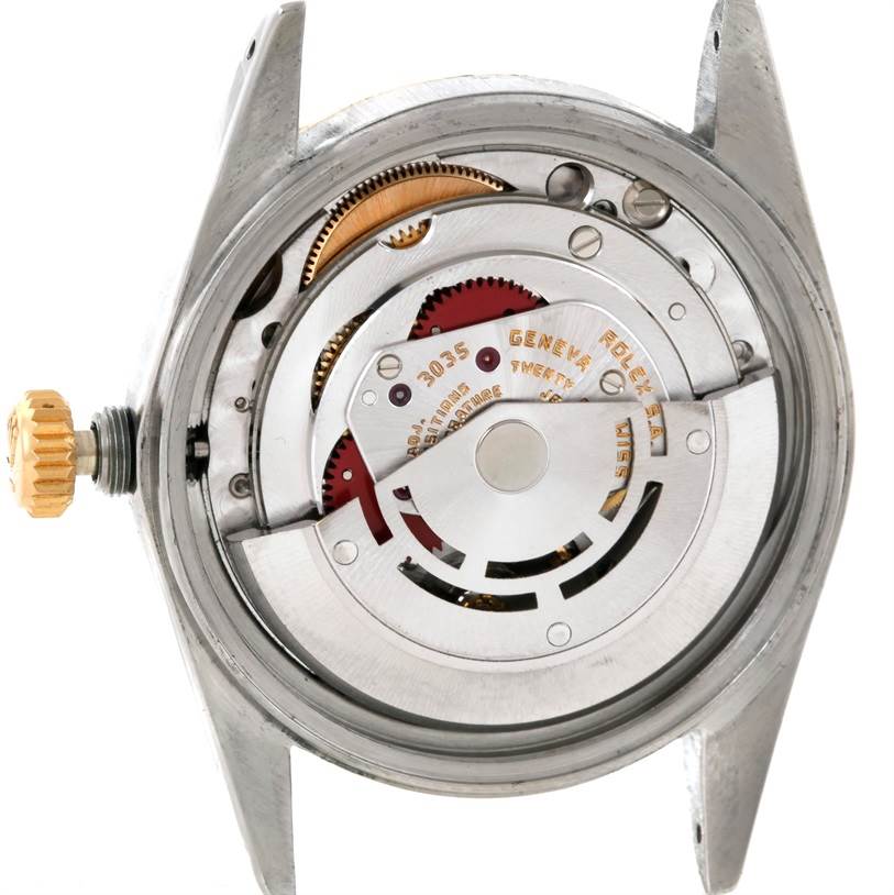This image shows the internal movement mechanism of a Rolex Datejust 16013 Men's Stainless Steel Champagne Dial 16013 Men's Stainless Steel Champagne Dial watch, with gears and components exposed.