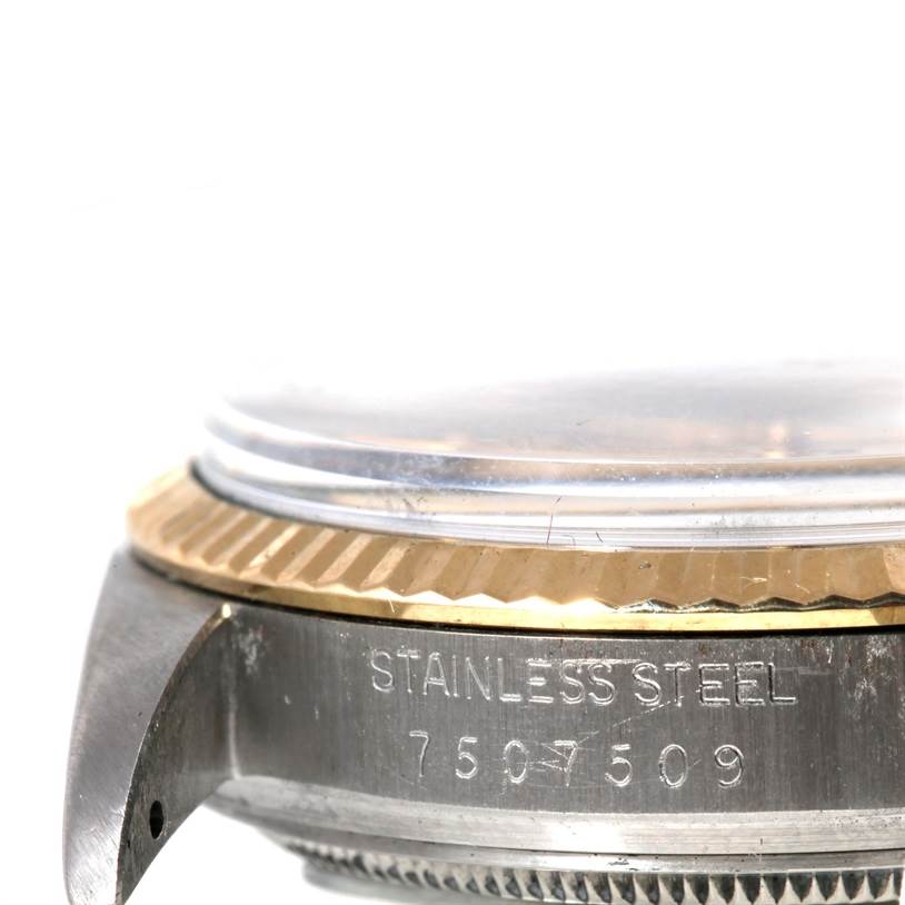 The image shows a close-up side view of the Rolex Datejust 16013 Men's Stainless Steel Champagne Dial 16013 Men's Stainless Steel Champagne Dial watch, focusing on the serial number engraving and part of the casing.