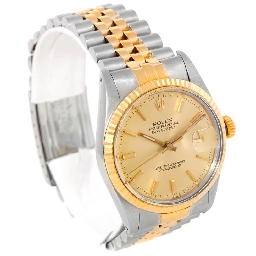 The image shows a Rolex Datejust 16013 Men's Stainless Steel Champagne Dial 16013 Men's Stainless Steel Champagne Dial watch with a two-tone bracelet, gold fluted bezel, and a champagne dial, angled slightly to the left.