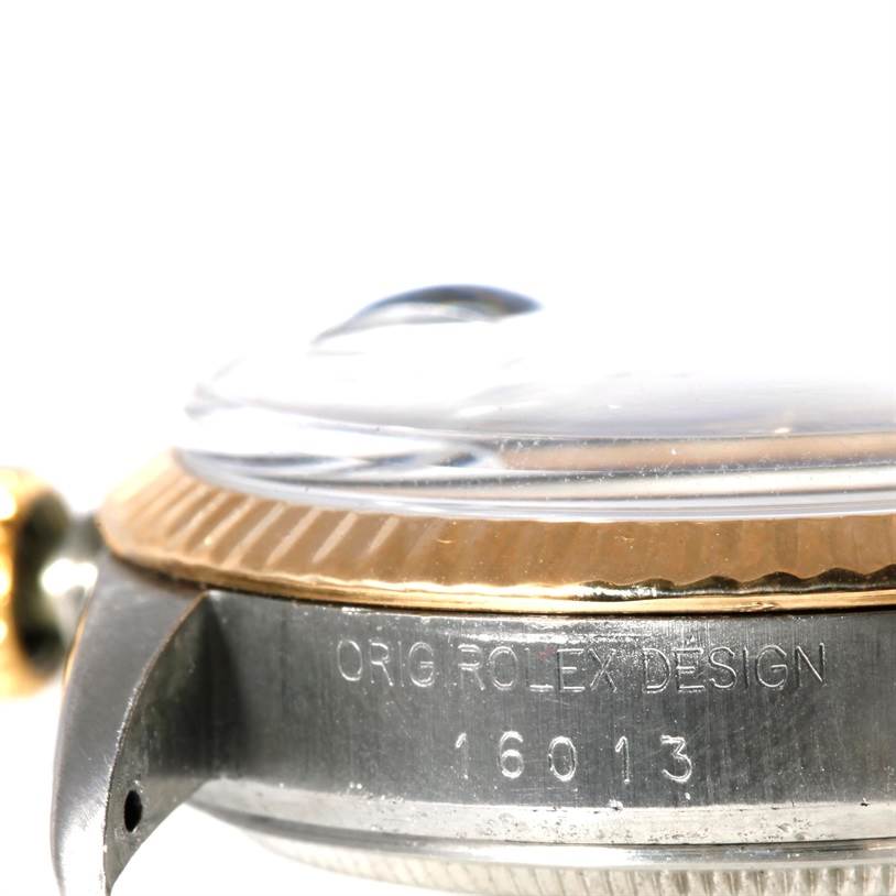 This image shows the side profile of the case and the bezel of a Rolex Datejust 16013 Men's Stainless Steel Black Dial 16013 Men's Stainless Steel Black Dial model, including the model number 16013 engraved on the side.