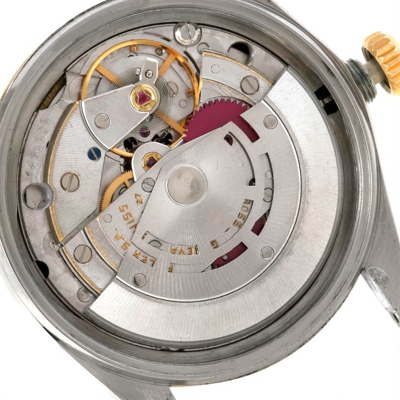 This image shows the movement mechanism of a Rolex Datejust 16013 Men's Stainless Steel Black Dial 16013 Men's Stainless Steel Black Dial watch from a back angle.