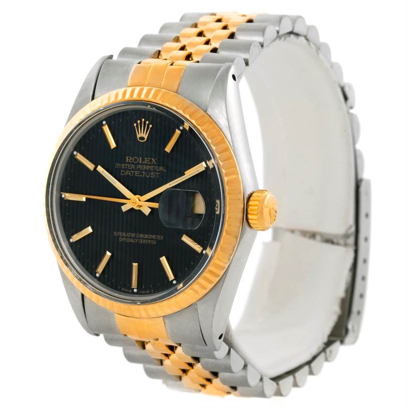 The Rolex Datejust 16013 Men's Stainless Steel Black Dial 16013 Men's Stainless Steel Black Dial watch is shown at a slight side angle, featuring its two-tone bracelet, black dial, and gold fluted bezel.