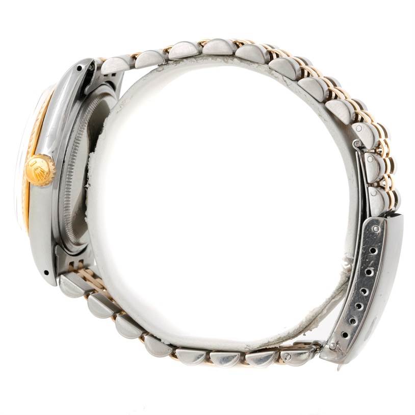 The image shows a side angle of the Datejust model watch by Rolex, focusing on its clasp and bracelet.