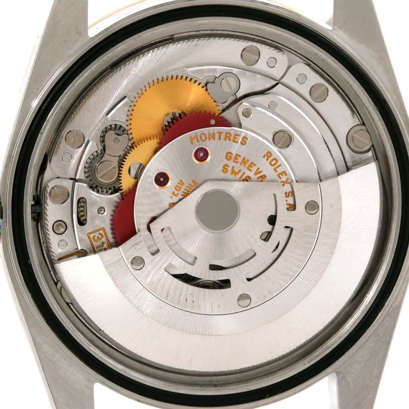 The image shows the exposed mechanical movement from the back of a Rolex Datejust 16233 Men's Steel and Gold (two tone) Champagne Dial 16233 Men's Steel and Gold (two tone) Champagne Dial watch.