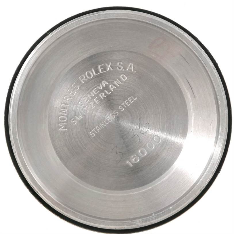 This image shows the inside case back of a Rolex Datejust 16013 Men's Stainless Steel Silver Dial 16013 Men's Stainless Steel Silver Dial watch, displaying model and brand engravings.