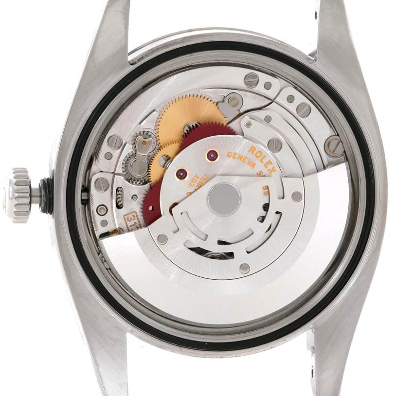 This image shows the internal movement mechanism of a Rolex Datejust 116234 Men's Stainless Steel Silver Dial 116234 Men's Stainless Steel Silver Dial watch from a rear angle.