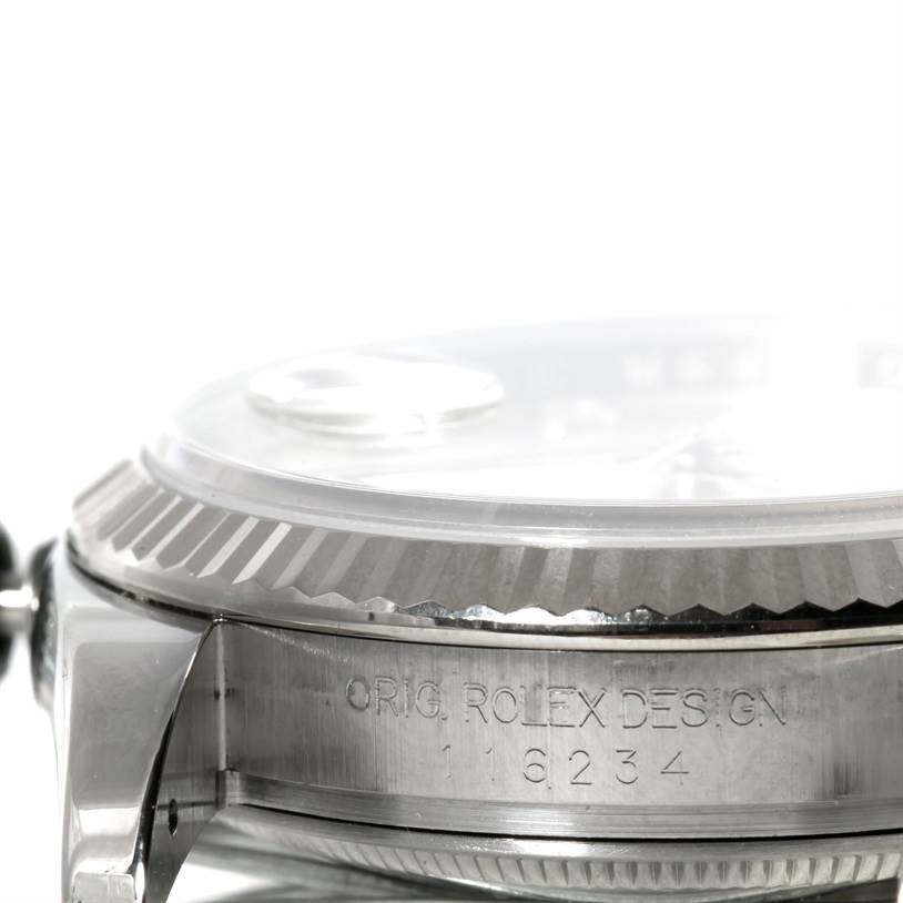 The image shows a side view of a Rolex Datejust 116234 Men's Stainless Steel Silver Dial 116234 Men's Stainless Steel Silver Dial watch case, highlighting the bezel and part of the dial with the Rolex design number.