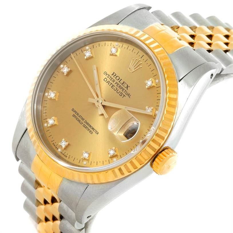 The image shows a Rolex Datejust 16233 Men
s Steel and Gold (two tone) Champagne Dial 16233 Men
s Steel and Gold (two tone) Champagne Dial watch at an angled view, displaying the gold dial, bezel, crown, and a portion of the two-tone bracelet.