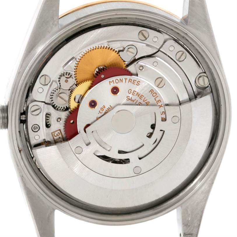 This image shows the internal mechanism of a Rolex Datejust 15223 Men's Steel and Gold (two tone) Black Dial 15223 Men's Steel and Gold (two tone) Black Dial watch viewed from the back.