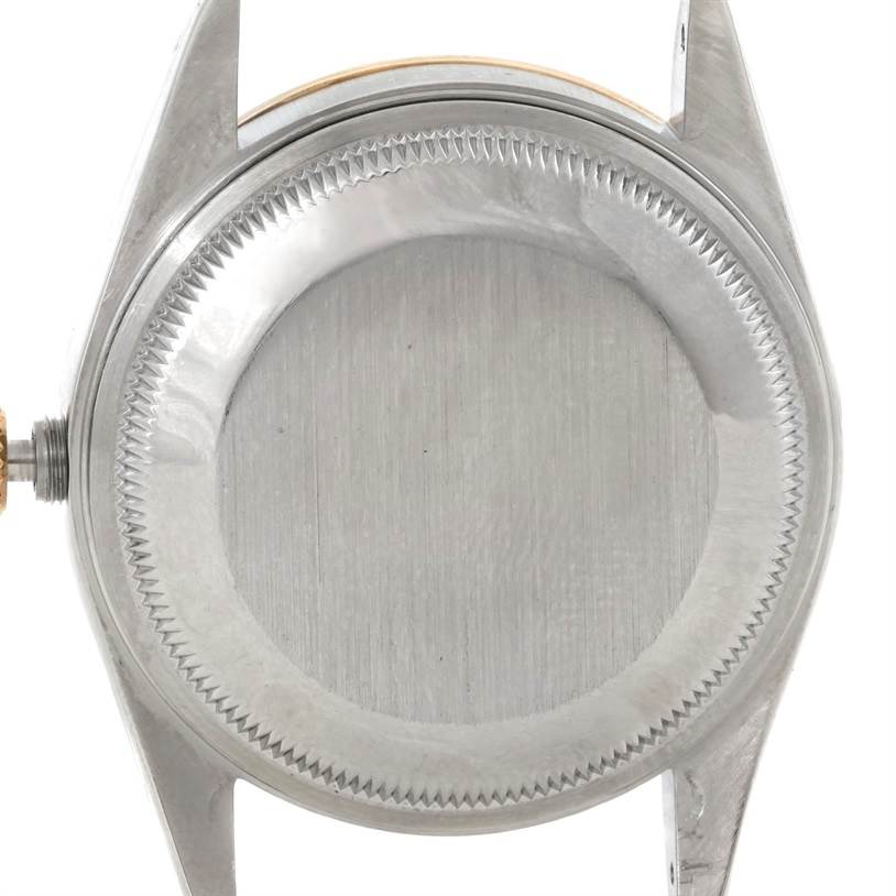 This image shows a front view of the watch case and crown of the Rolex Datejust 15223 Men's Steel and Gold (two tone) Black Dial 15223 Men's Steel and Gold (two tone) Black Dial model, without the dial and hands.