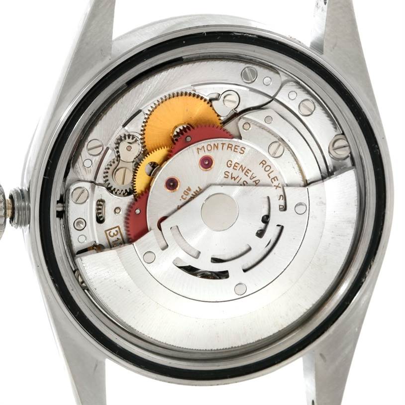 The image shows the internal mechanism and rotor of a Rolex Datejust 16220 Men's Stainless Steel Silver Dial 16220 Men's Stainless Steel Silver Dial watch from a backside angle.