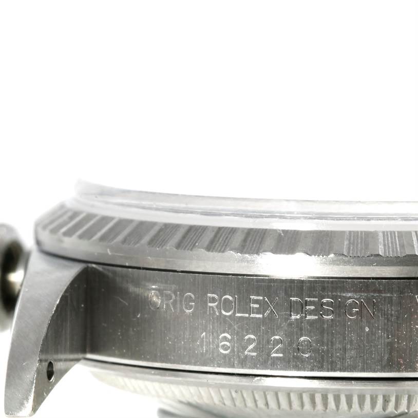 The image shows a close-up side view of the case and bezel of a Rolex Datejust 16220 Men's Stainless Steel Silver Dial 16220 Men's Stainless Steel Silver Dial watch, showing the engraved model number.