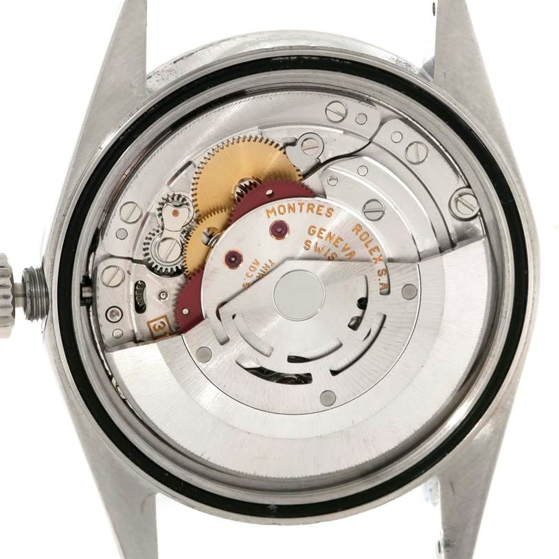 This image shows the movement mechanism of a Rolex Datejust 16220 Men's Stainless Steel Silver Dial 16220 Men's Stainless Steel Silver Dial watch from the back angle with the case removed.