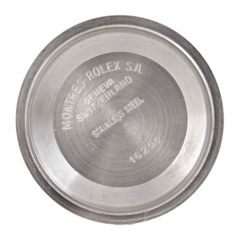 This image shows the inside case back of a Rolex Datejust 16220 Men
s Stainless Steel Grey Dial 16220 Men
s Stainless Steel Grey Dial, emphasizing the engraved brand details and model number.