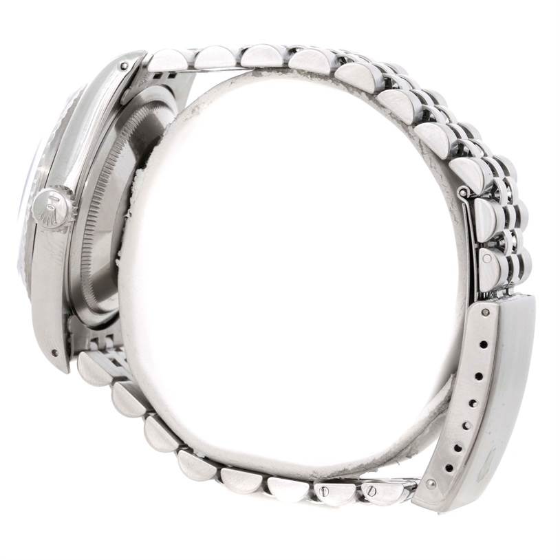 This image shows a side view of a Rolex Datejust 16220 Men
s Stainless Steel Grey Dial 16220 Men
s Stainless Steel Grey Dial watch highlighting the case, crown, and bracelet.