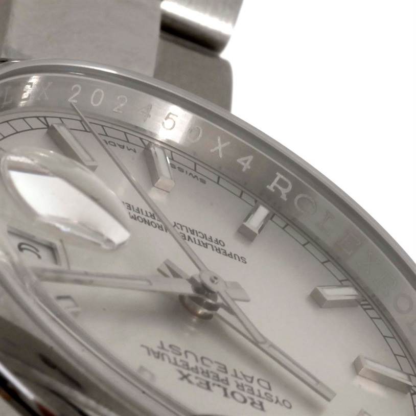 This close-up angle shows the dial, hands, magnified date window, and part of the bezel of the Rolex Datejust 116200 Men's Stainless Steel Silver Dial 116200 Men's Stainless Steel Silver Dial model.