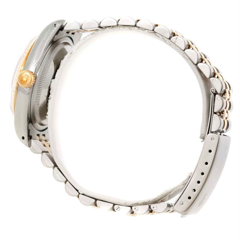 The image shows a side view of a Rolex Datejust 16233 Men's Steel and Gold (two tone) Champagne Dial 16233 Men's Steel and Gold (two tone) Champagne Dial watch case and bracelet.