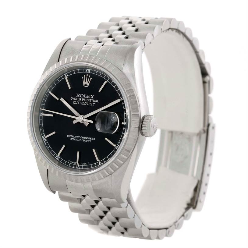 This image shows a Rolex Datejust 16220 Men
s Stainless Steel Black Dial 16220 Men
s Stainless Steel Black Dial watch at an angled side view, revealing the dial, fluted bezel, crown, and the Jubilee bracelet.