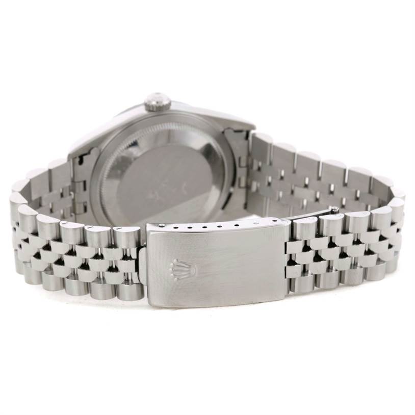 The image shows the rear view of the Rolex Datejust 16220 Men
s Stainless Steel Black Dial 16220 Men
s Stainless Steel Black Dial watch, focusing on the case back and Jubilee bracelet with the clasp.