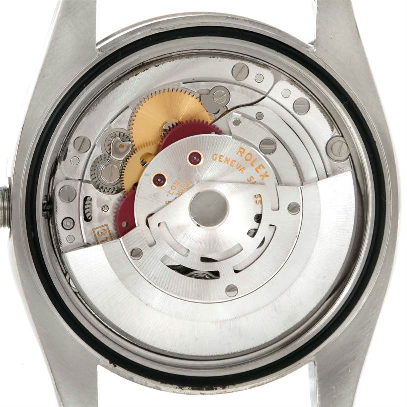 This image shows the internal mechanism of a Rolex Datejust 116234 Women's Stainless Steel White Dial 116234 Women's Stainless Steel White Dial watch from a back angle with the case back removed.