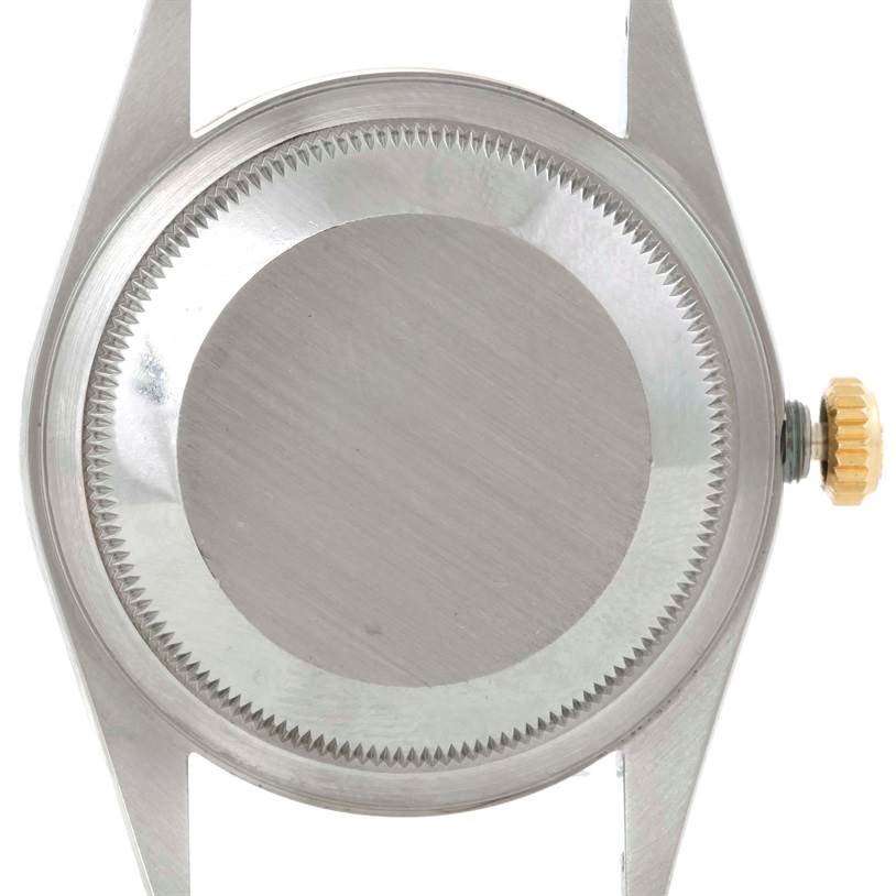 The image shows the back view of a Rolex Datejust 16233 Men's Steel and Gold (two tone) Champagne Dial 16233 Men's Steel and Gold (two tone) Champagne Dial model watch case, including the case back and crown.