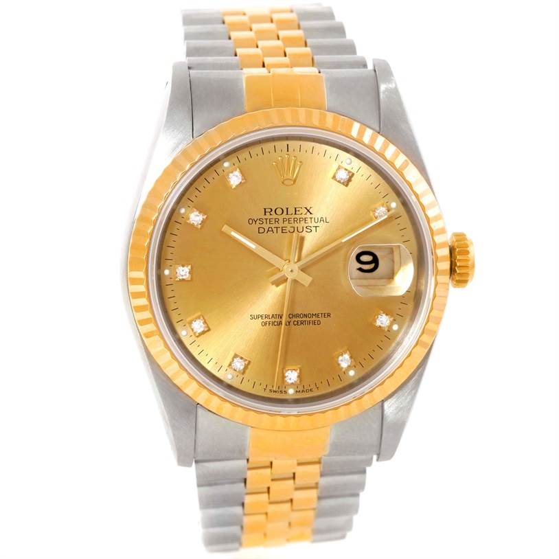 This image shows a Rolex Datejust 16233 Men's Steel and Gold (two tone) Champagne Dial 16233 Men's Steel and Gold (two tone) Champagne Dial watch from a front angle, highlighting its golden dial, date window, and two-tone bracelet.