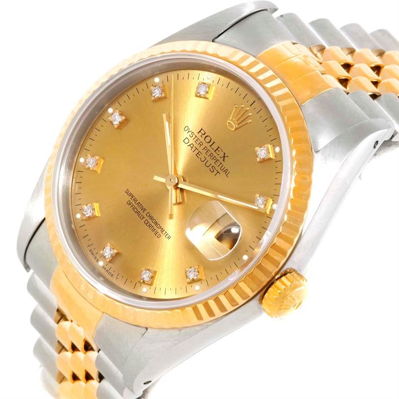The image shows a close-up angle of a Rolex Datejust 16233 Men's Steel and Gold (two tone) Champagne Dial 16233 Men's Steel and Gold (two tone) Champagne Dial watch, highlighting its gold dial, fluted bezel, crown, and part of the bracelet.
